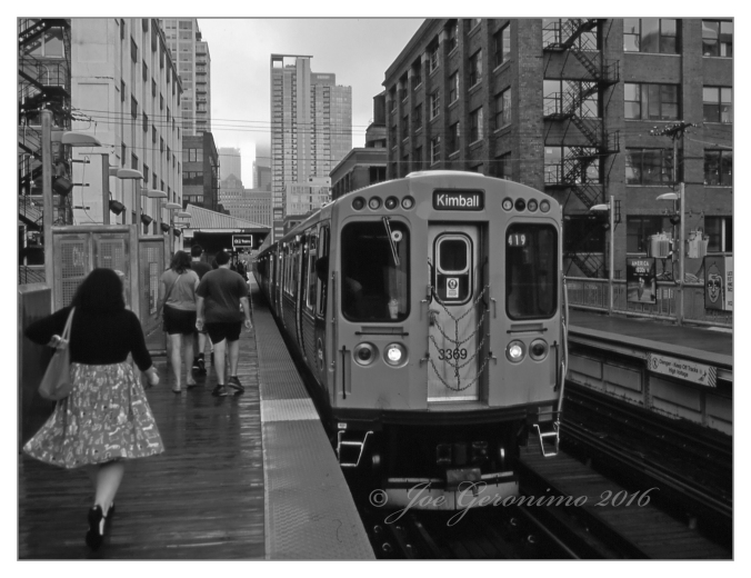 The Chicago "L" July 15th 2016. You can notice walking ahead is Julie, Michael & Max. Agfa CT Precisa Slide Film, © Joe Geronimo